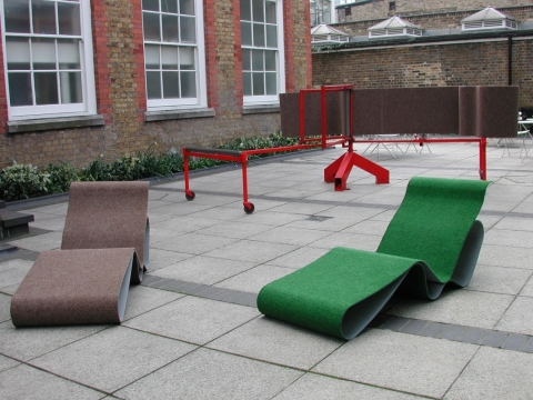 Project For ECAL Living 2001. Painted steel, stainless steel, outdoor carpet. Performance & devise for producing  reclining chairs made from a single ribbon of material